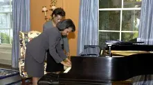 Кондолиза Райс свири на Арета Франклин