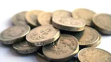 Фалшиви монети заливат Великобритания
