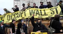 Десетки хиляди привърженици на „Окупирай Уолстрийт вървяха пеша от Ню Йорк до Вашингтон