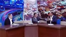 Видео: Депутат заплаши с пистолет свой опонент в телевизионен дебат на живо