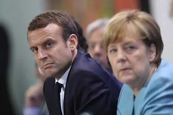 Мигрантите засенчват Еврозоната на срещата Меркел-Макрон 