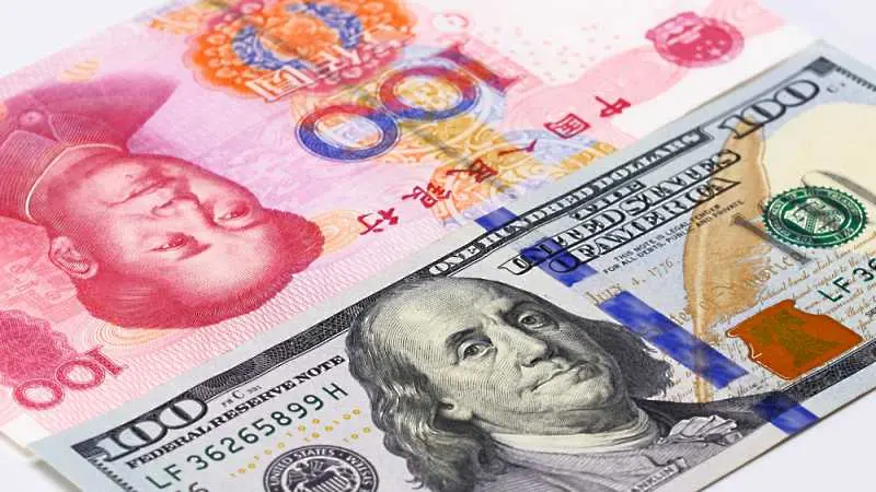 Поевтиняването на юана смекчава последиците от търговската война